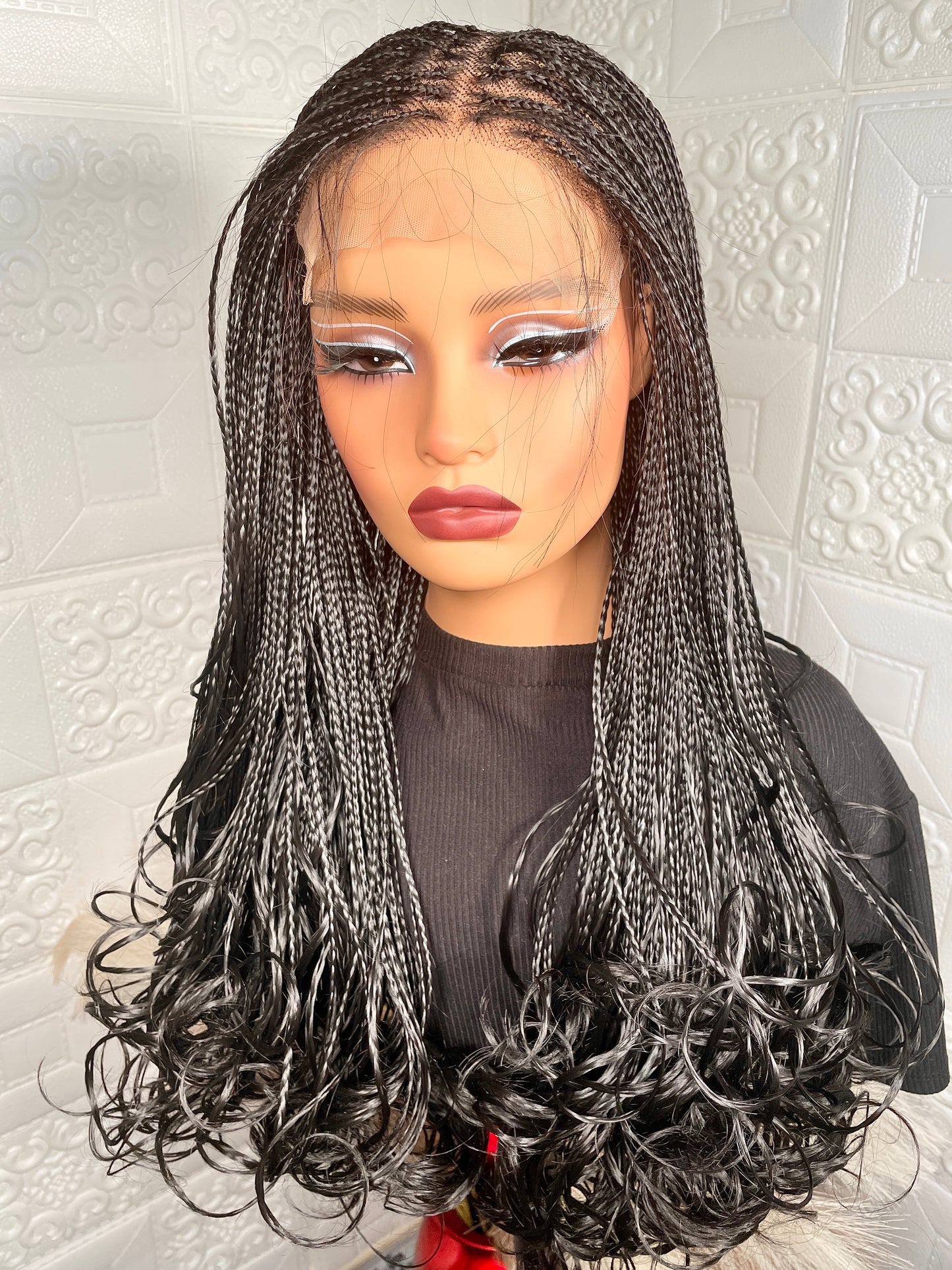 5 by 5 human hair base closure knotless braided wig in 16-18 inches long.