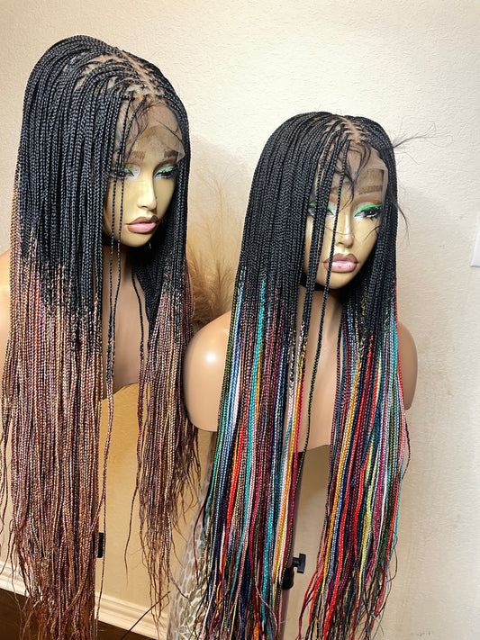 Micro knotless braids with rainbow tips made with 360 hair blend lace in 30 inches.