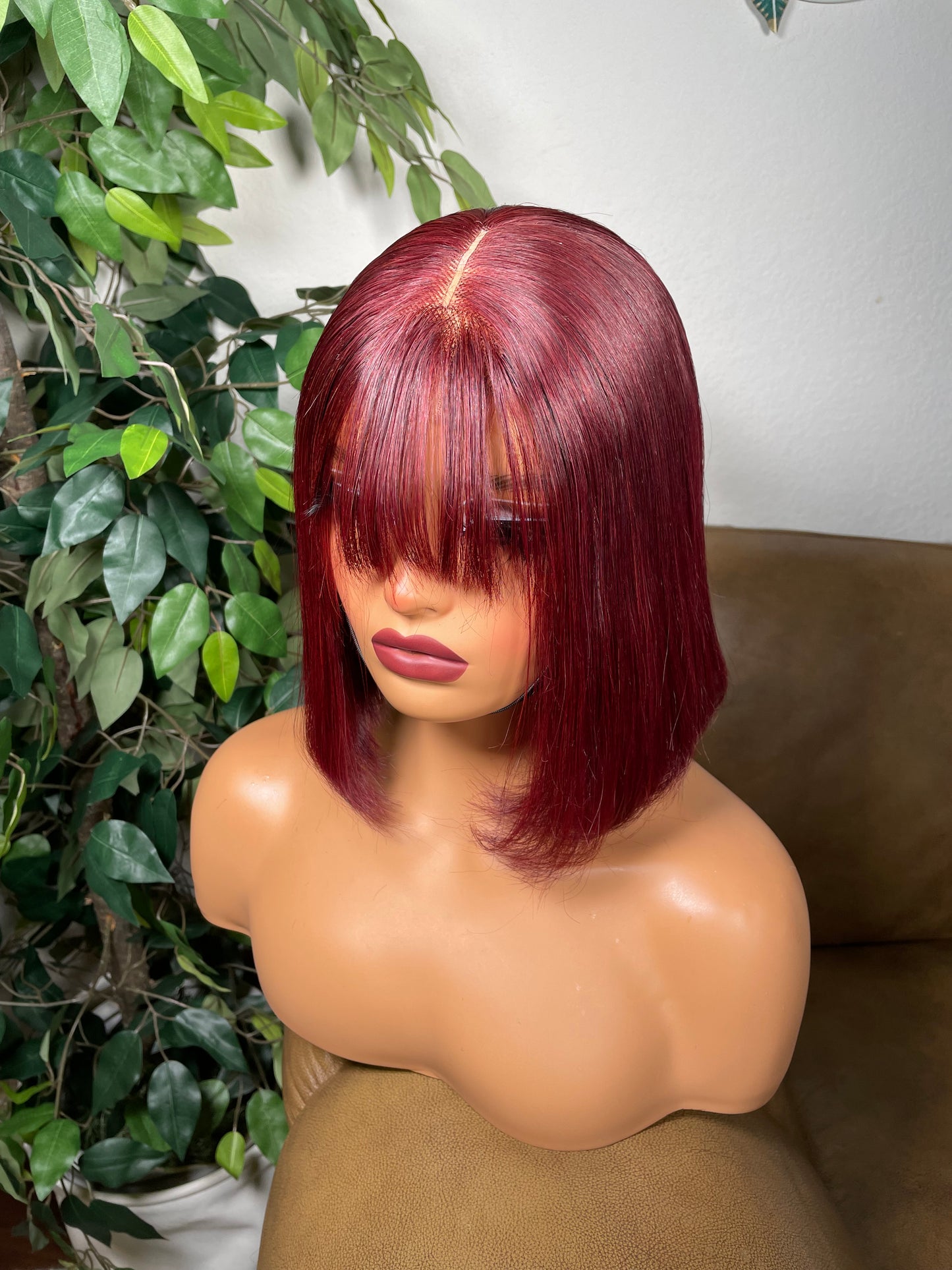 8 inches glueless bob wig with bangs.