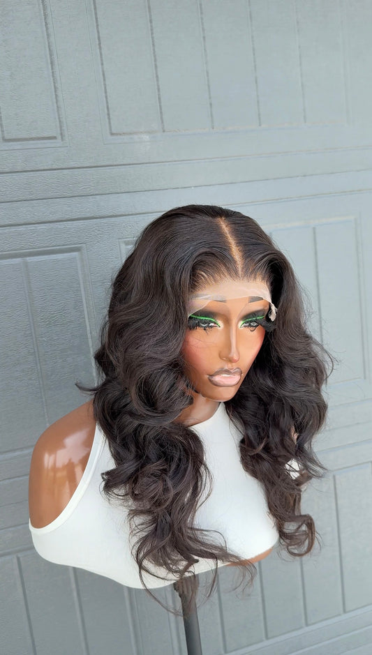Vietnamese Donor wavy bounce human hair wig. ( pre plucked and pre bleached and) 18, 16 and 14 inches layered wig( 300 grams + 5x5 closure